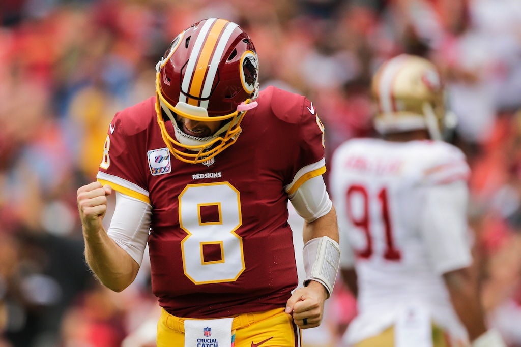 Washington quarterback Kirk Cousins (8) celebrates wide receiver Josh Doctson's touchdown during the first half of an NFL football game against the San Francisco 49ers in Landover, Md., Sunday, Oct. 15, 2017. (AP Photo/Mark Tenally)