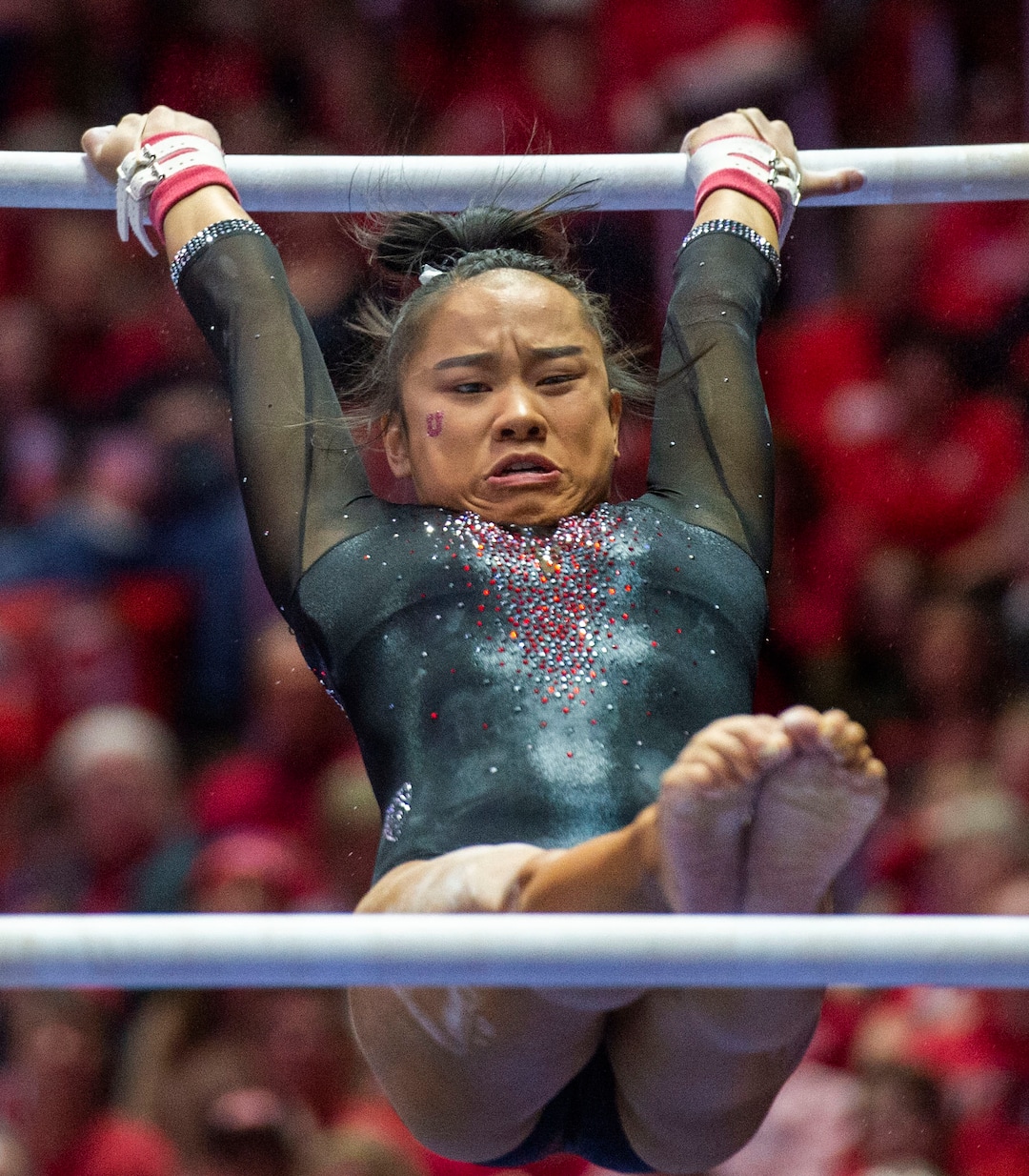 (Rick Egan  |  The Salt Lake Tribune)  THe Kim Tessen competes on the uneven bars, in PAC-12 gymnastics action between the UCLA Bruins and the University of Utah, at the Jon M. Huntsman Center, Saturday, Feb. 23, 2019.