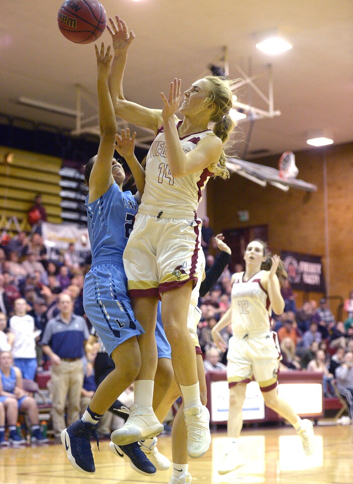 (Leah Hogsten  |  Tribune File Photo)  Viewmont's Grace Johnson swats away Layton's Brenda Gallegos' shot. Layton High School leads Viewmont High School 19-15 girls' basketball team, Tuesday, February 7, 2017 in Bountiful.