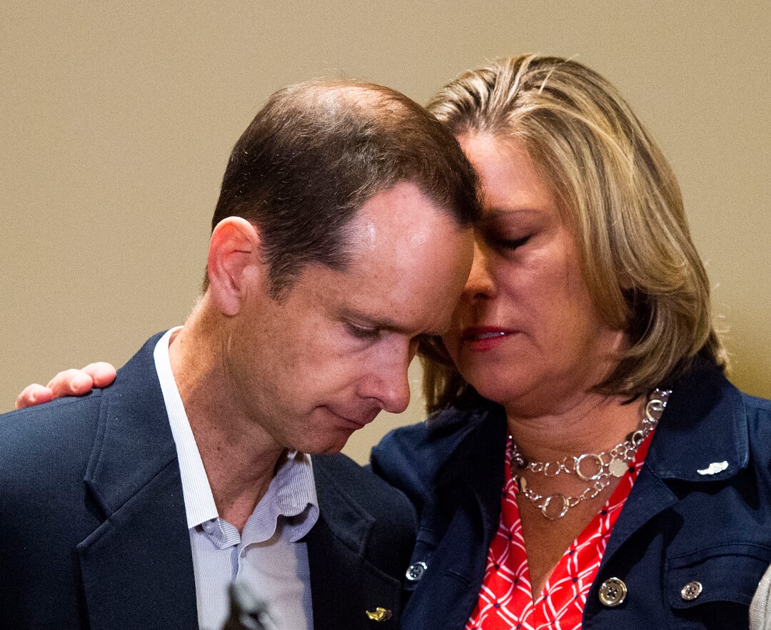 (Rick Egan | The Salt Lake Tribune) Matt McCluskey and his wife Jill hug during a news conference Thursday, June 27, 2019, following the filing of a lawsuit against the University of Utah for $56 million, alleging campus police could have done more to prevent the murder of their daughter Lauren.