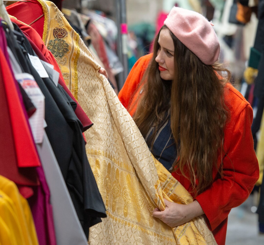 (Rick Egan  |  The Salt Lake Tribune)  Social media influencer Caitlin Boyes checks out a costume during a preview event for "Norma," at the Utah Opera Production Studios, Monday, April 15, 2019.