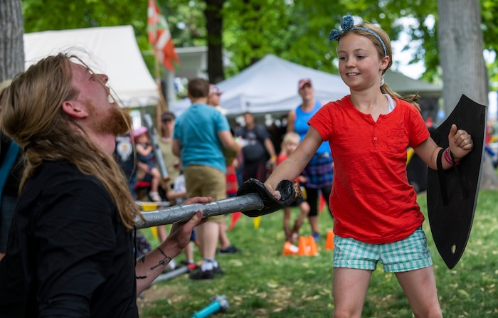 (Rick Egan | The Salt Lake Tribune) Emma Lillywhite, 10, stabs Hu Brownwhile sparing in the featherweight competition, at the Payson Scottish Festival, on Saturday, July 9, 2022.

