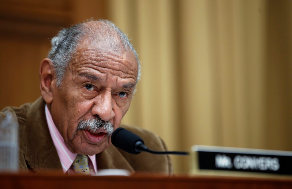 FILE- In this April 4, 2017, file photo, Rep. John Conyers, D-Mich., speaks during a hearing of the House Judiciary subcommittee on Capitol Hill in Washington. Buzzfeed, a news website, is reporting that Conyers settled a complaint in 2015 from a woman who alleged she was fired from his Washington staff because she rejected his sexual advances. Calls to Conyers and his office seeking comment were not immediately returned Monday, Nov. 20. (AP Photo/Alex Brandon, File)