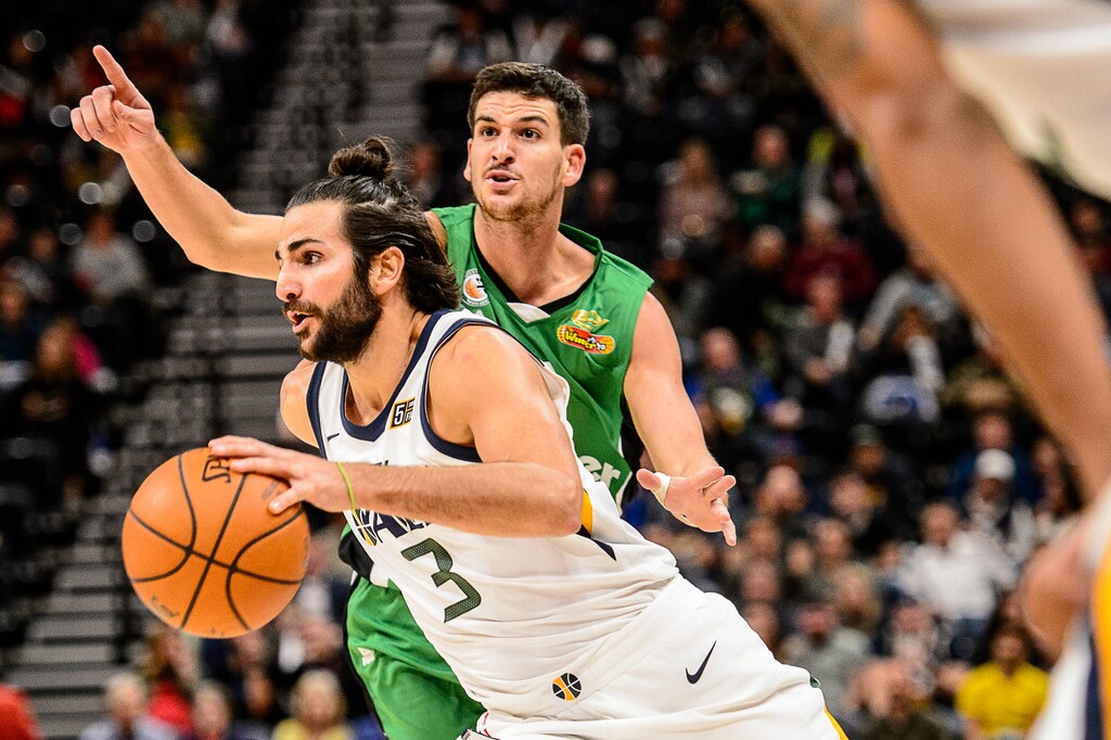 (Trent Nelson | The Salt Lake Tribune) Utah Jazz guard Ricky Rubio (3) drives past Maccabi Haifa's Frederic Bourdillon as the Utah Jazz host Maccabi Haifa, preseason NBA basketball at Vivint Smart Home Arena in Salt Lake City Wednesday October 4, 2017.