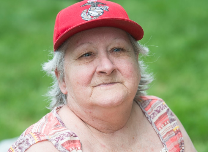 (Rick Egan  |  The Salt Lake Tribune)      
Sugar House resident, Janice Mullins met her husband Derek Mullins three years ago this weekend, when they were both homeless. They returned to Pioneer park to visit friends, as the Salt Lake City Mission fed and donated clothes to the homeless in Pioneer Park on Memorial day, Monday, May 28, 2018.


