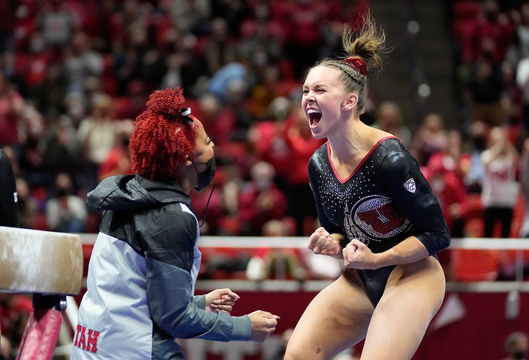(Francisco Kjolseth | The Salt Lake Tribune) Utah’s Maile O’Keefe performs celebrates her perfect 10 on the beam during the gymnastics meet with Stanford at the Huntsman Center in Salt Lake City, Saturday, Jan. 29, 2022. 