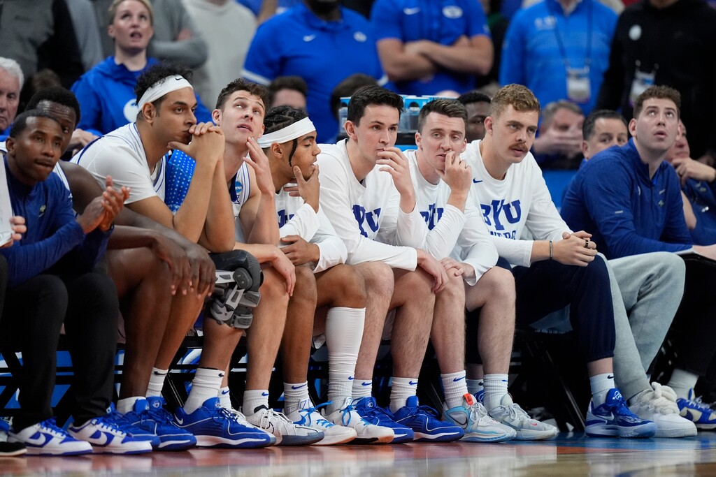 (Charlie Neibergall | AP) The BYU bench watches in the final minute of the game against Duquesne in a first-round college basketball game in the NCAA Tournament, Thursday, March 21, 2024, in Omaha, Neb.