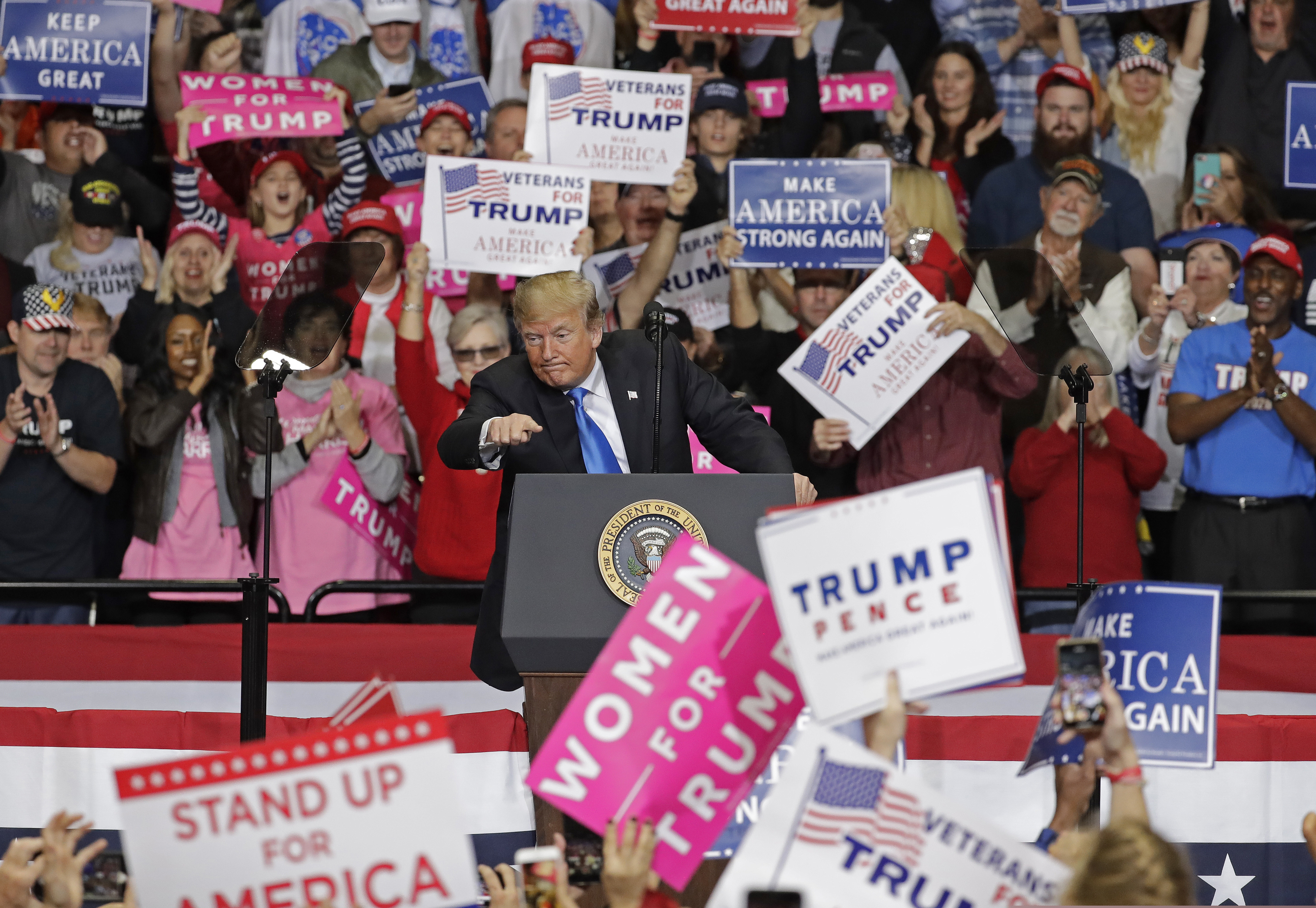 (Chuck Burton  |  AP Photo)  President Donald Trump gestures to the crowd during a campaign rally in Charlotte, N.C., Friday, Oct. 26, 2018.