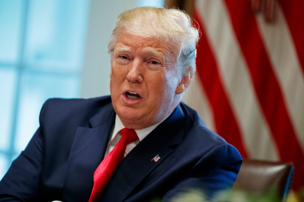 FILE - In this Thursday, June 13, 2019, file photo, President Donald Trump speaks during a meeting in the Cabinet Room of the White House, in Washington. In a tweet late Monday, June 17, 2019, Trump said that U.S. Immigration and Customs Enforcement will begin removing millions of people who are in the country illegally. (AP Photo/Evan Vucci, File)