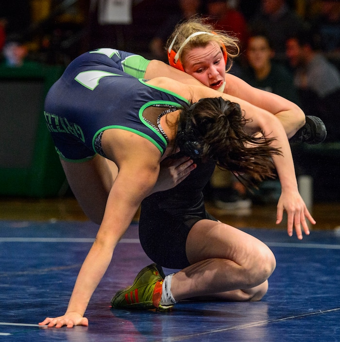 (Steve Griffin  |  The Salt Lake Tribune) Marlynne Deede, of Springville, right, escapes the hold of Jazmin Herrera, of Copper Hills during the All-Star Duals wrestling at Utah Valley University's UCCU Center in Orem Tuesday January 9, 2018.
