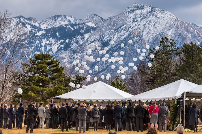(Trent Nelson | The Salt Lake Tribune)  Grandchildren release balloons at the graveside service for Jon Huntsman Sr. at Wasatch Lawn Memorial Park & Mortuary in Salt Lake City, Saturday February 10, 2018.