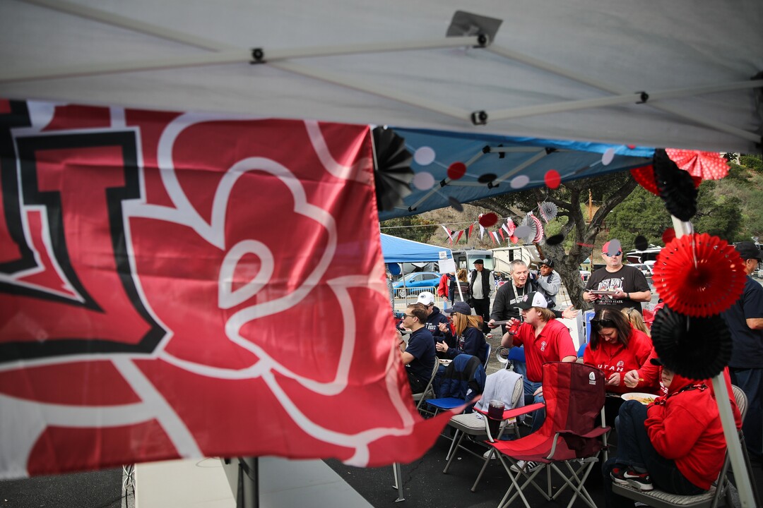 (Meg Oliphant | Special to The Tribune) Fans tailgate ahead of the game between the Penn State Nittany Lions and the Utah Utes at Rose Bowl Stadium on Jan. 2, 2023 in Pasadena, Calif.