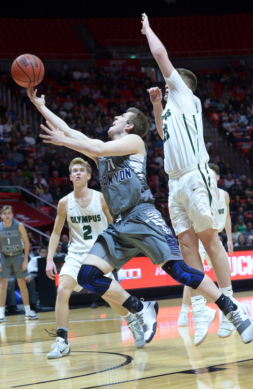 (Leah Hogsten  |  The Salt Lake Tribune) Corner Canyon's Ammon Jensen (11). Olympus defeated Corner Canyon 76-49 to win the 5A High School BoysÕ Basketball Tournament Championship at the Jon M. Huntsman Center in Salt Lake City,  Saturday, March 3, 2018. 