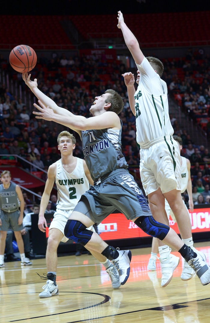 (Leah Hogsten | The Salt Lake Tribune) Corner Canyon's Ammon Jensen (11). Olympus defeated Corner Canyon 76-49 to win the 5A High School BoysÕ Basketball Tournament Championship at the Jon M. Huntsman Center in Salt Lake City, Saturday, March 3, 2018.