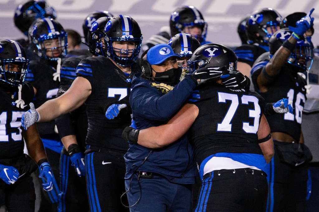 (Trent Nelson  |  The Salt Lake Tribune) Brigham Young Cougars defensive lineman Caden Haws (73) celebrates a stop as BYU hosts San Diego State, NCAA football in Provo on Saturday, December 12, 2020.