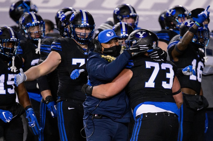 (Trent Nelson | The Salt Lake Tribune) Brigham Young Cougars defensive lineman Caden Haws (73) celebrates a stop as BYU hosts San Diego State, NCAA football in Provo on Saturday, December 12, 2020.