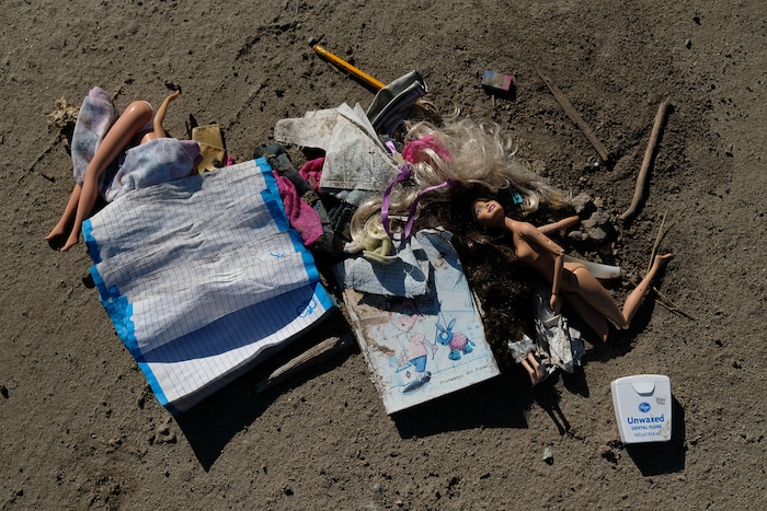 (Francisco Kjolseth  |  The Salt Lake Tribune)  Remains of a removed transient camp litter the ground in West Salt Lake City as members of One Voice Recovery and the Volunteers Of America are left to keep looking for those in need of services and support as they make the rounds on Monday, Oct. 16, 2017. 