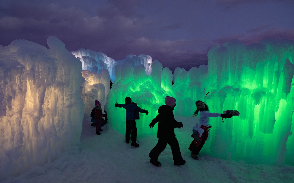 (Francisco Kjolseth | The Salt Lake Tribune) Thousands of hand-placed icicles form a frozen landscape that delights as kids explore within the Ice Castles in Midway, which returns for its midwinter run, Jan. 17-Feb. 8, 2025.