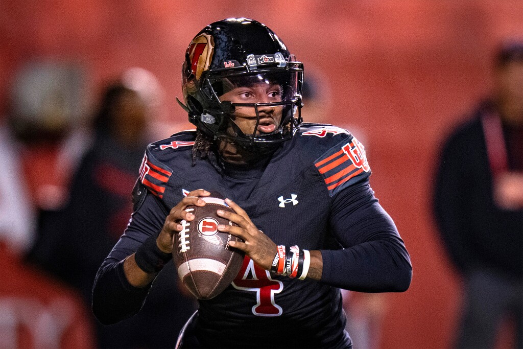 (Rick Egan | The Salt Lake Tribune) Utah Utes quarterback Devon Dampier (4) looks to throw against the Cincinnati Bearcats at Rice-Eccles Stadium on Nov. 1, 2025.

