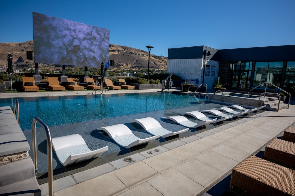 (Trent Nelson  |  The Salt Lake Tribune) The rooftop pool and jumbotron at Camber in Salt Lake City on Friday, Sept. 4, 2026.