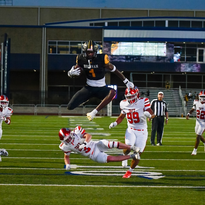 (Courtesy Aiden Martin) Utah Utes 3-star safety commit Aiden Martin jumps over a defender in his high school football game. Martin attends William J. Brennan High School in San Antonio, Texas.