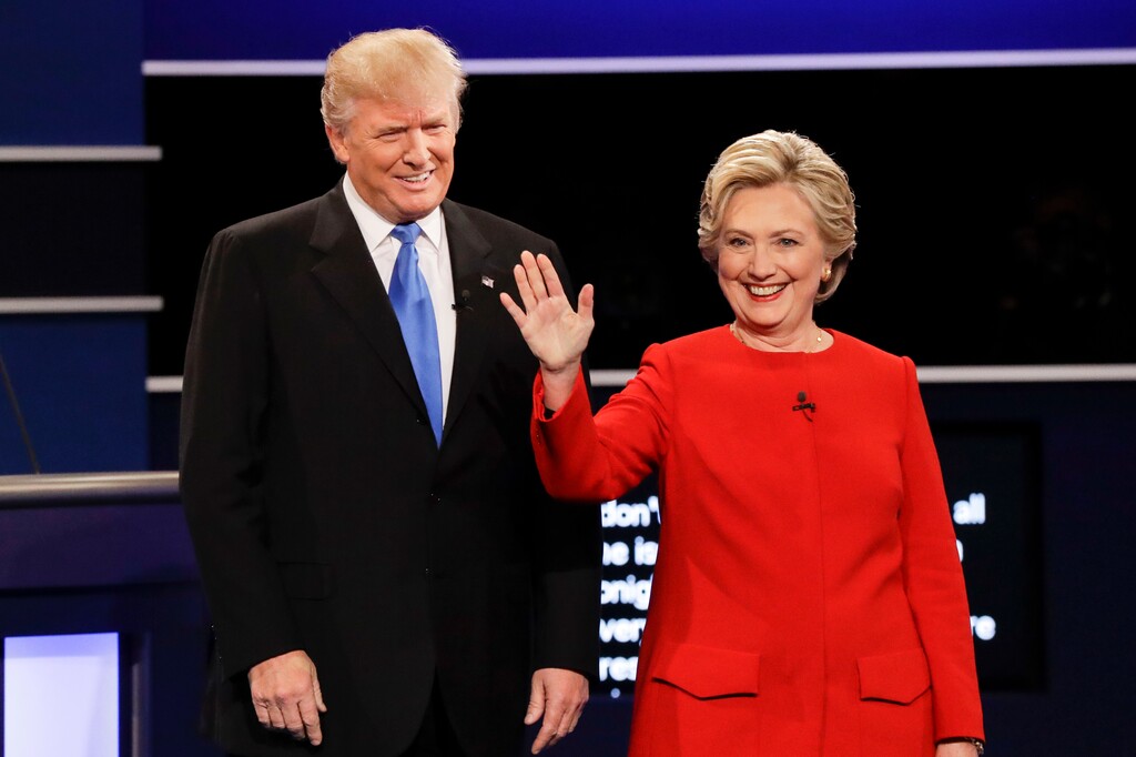 (David Goldman | AP file photo) In this Sept. 26, 2016, photo, then-Republican presidential nominee Donald Trump and then-Democratic presidential nominee Hillary Clinton are introduced during the presidential debate at Hofstra University in Hempstead, N.Y.