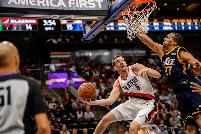 (Trent Nelson | The Salt Lake Tribune)  Portland Trail Blazers guard Pat Connaughton (5) defended by Utah Jazz center Rudy Gobert (27) as the Utah Jazz host the Portland Trail Blazers, NBA basketball in Salt Lake City, Wednesday November 1, 2017.