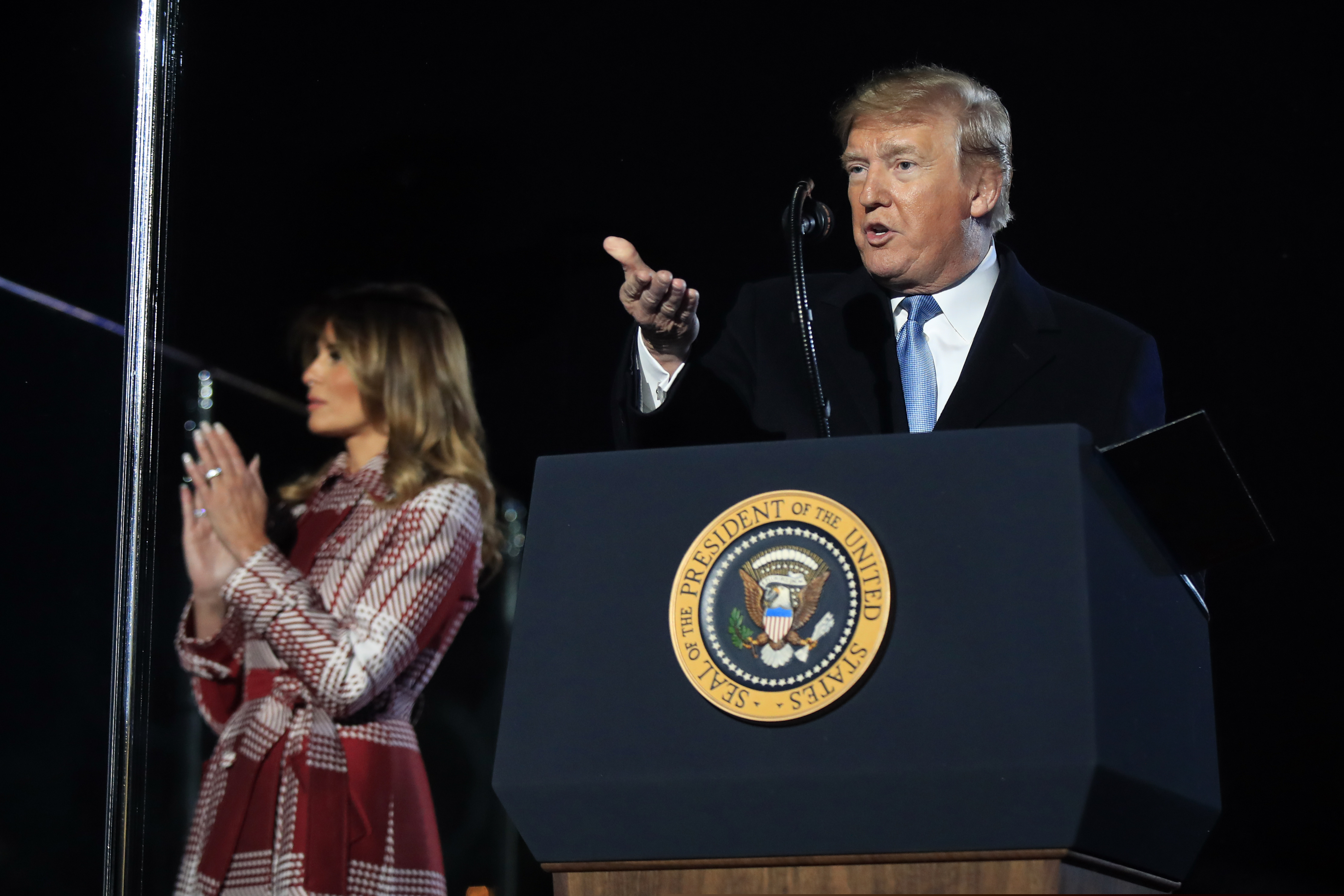 (Manuel Balce Ceneta | AP) President Donald Trump and first lady Melania Trump attend the National Christmas Tree lighting ceremony at the Ellipse near the White House in Washington, Thursday, Dec. 5, 2019.
