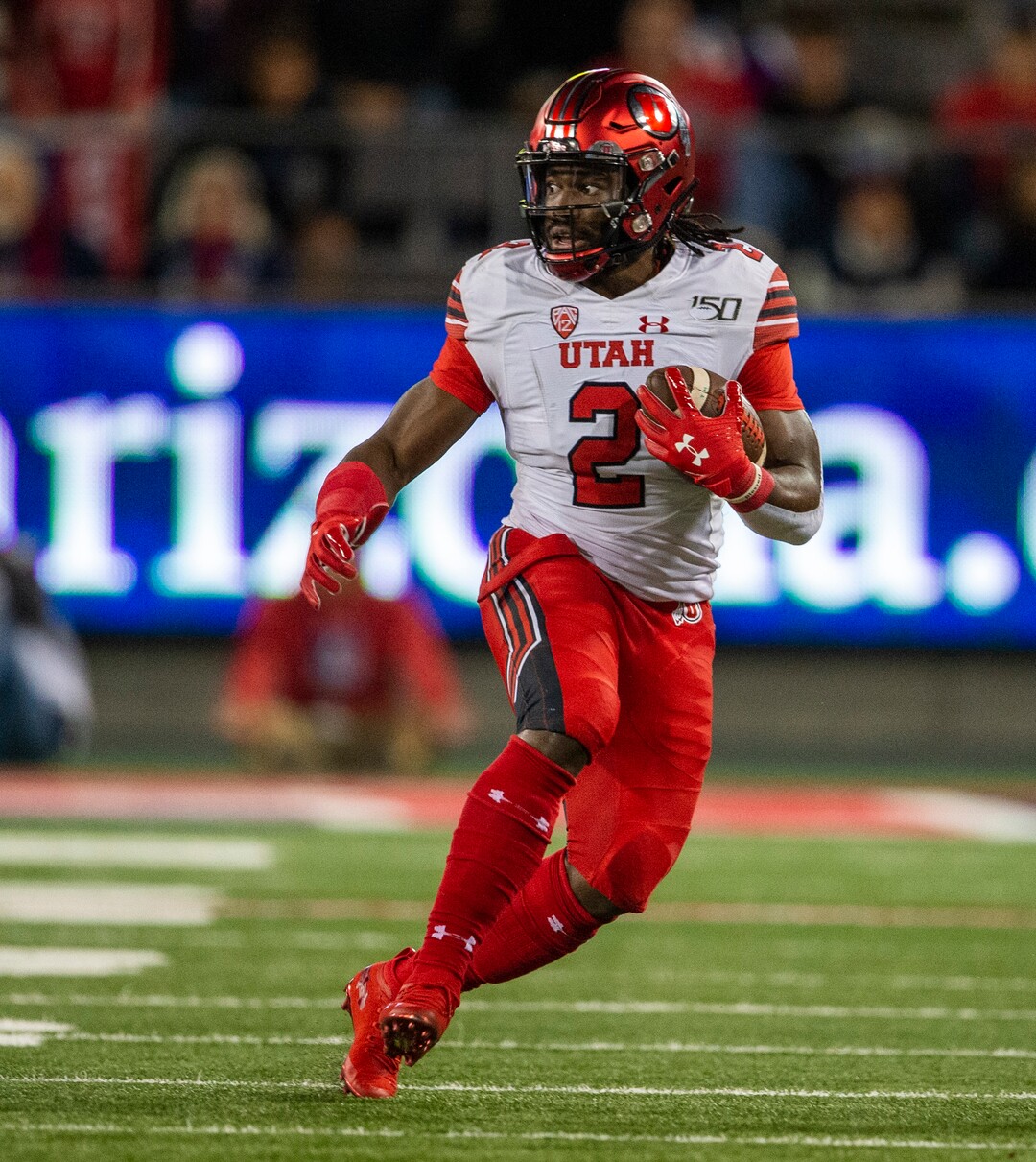 (Rick Egan  |  The Salt Lake Tribune)     Utah running back Zack Moss (2) runs the ball for the Utes, in PAC-12 action between the Utah Utes and the Arizona Wildcats in Tucson, Saturday, Nov. 23, 2019.