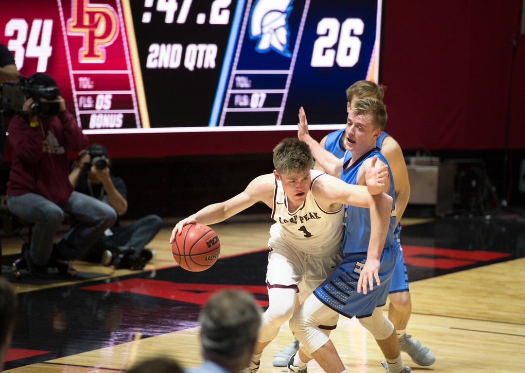 Scott Sommerdorf | The Salt Lake TribuneLone Peak's Max Brenchley battles to bring the ball up after a rebound. Lone Peak beat Layton 82-47, in a boy's 6A semi-final, FrIday, March. 2, 2018.