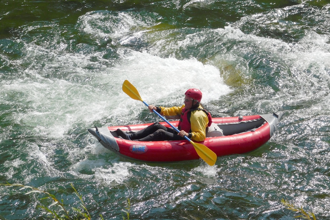 A paddler maneuvers his inflatable duckie kayak through a rapid on the Salmon River on August 19, 2017 near Stanley, Idaho. (Erin Alberty  |  The Salt Lake Tribune)