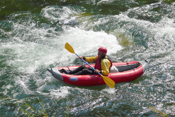 A paddler maneuvers his inflatable duckie kayak through a rapid on the Salmon River on August 19, 2017 near Stanley, Idaho. (Erin Alberty  |  The Salt Lake Tribune)
