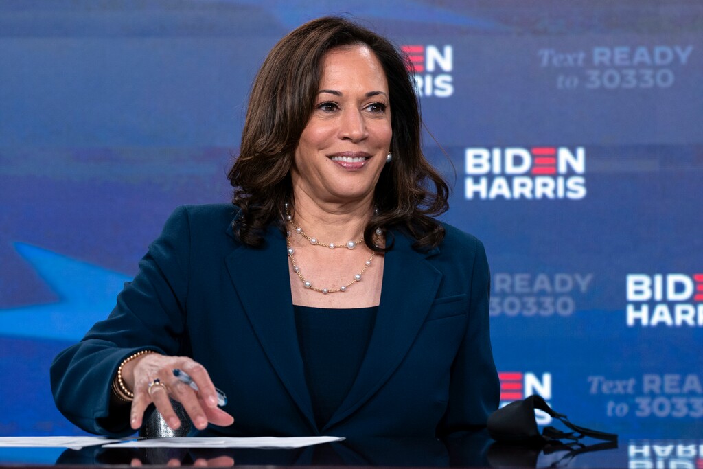 (Carolyn Kaster | The Associated Press) Democratic presidential candidate former Vice President Joe Biden's running mate Sen. Kamala Harris, D-Calif., looks up as she signs required documents for receiving the Democratic nomination for President and Vice President of the United States in Wilmington, Del., Friday, Aug. 14, 2020.