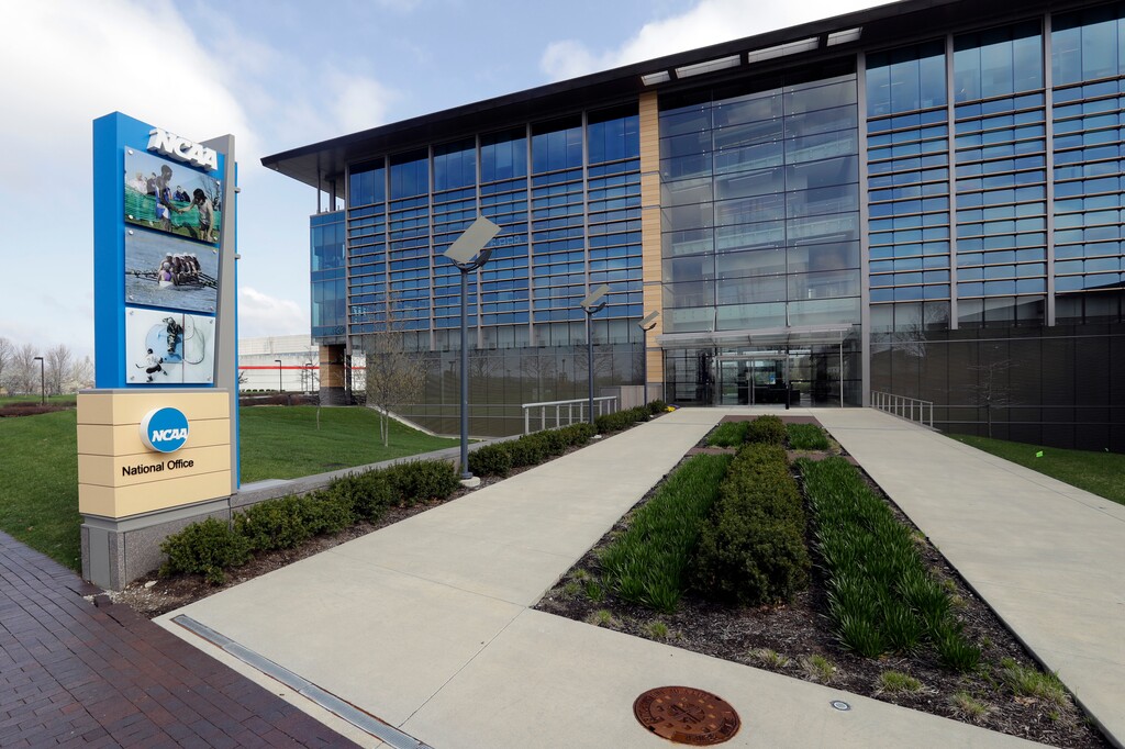 (AP Photo/Darron Cummings, File) This is an April 25, 2018, file photo, showing NCAA headquarters in Indianapolis. The NCAA is facing more than 300 lawsuits from former college football players who claim their concussions were mistreated, leading to medical issues spanning from headaches to depression and in some cases early onset Parkinson’s and Alzheimer's disease.