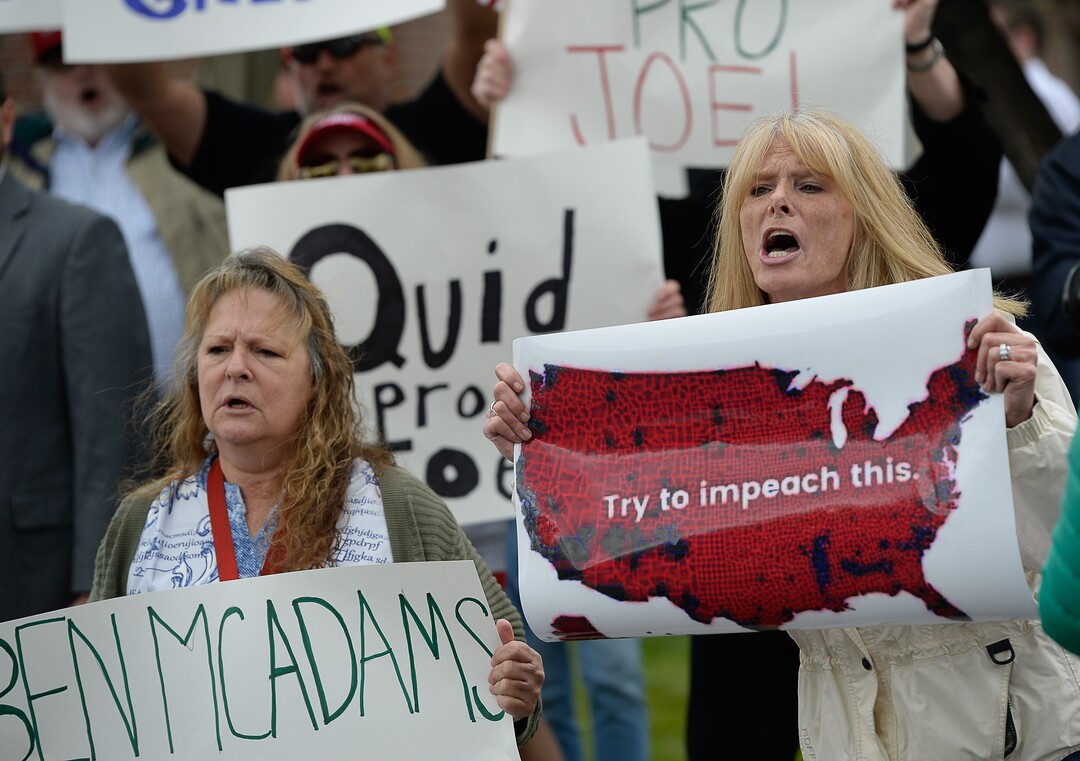 (Francisco Kjolseth | The Salt Lake Tribune) Carolyn Howard, right, argues with critics of President Trump as two competing rallies spar near Rep. Ben McAdams' office in West Jordan, one seeking to support McAdams and one to criticize him for supporting the impeachment inquiry of President Donald Trump on Wednesday, Oct. 9, 2019.