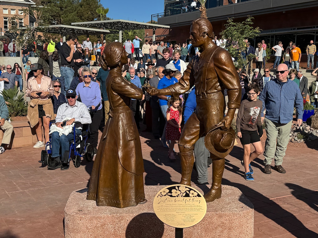 (Mark Eddington | The Salt Lake Tribune) “One Beautiful Thing,” a sculpture that depicts David and Wilhelmina Cannon, early settlers in 1861, is unvelied during the grand opening of the St. George City Hall Plaza, Friday, April 3, 2026.