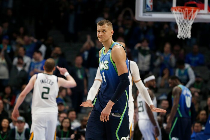 Dallas Mavericks forward Kristaps Porzingis (6) reacts after shooting an airball against the Utah Jazz during the second half an NBA basketball game in Dallas, Monday, Feb. 10, 2020. Utah defeated Dallas 123-119. (AP Photo/Michael Ainsworth)