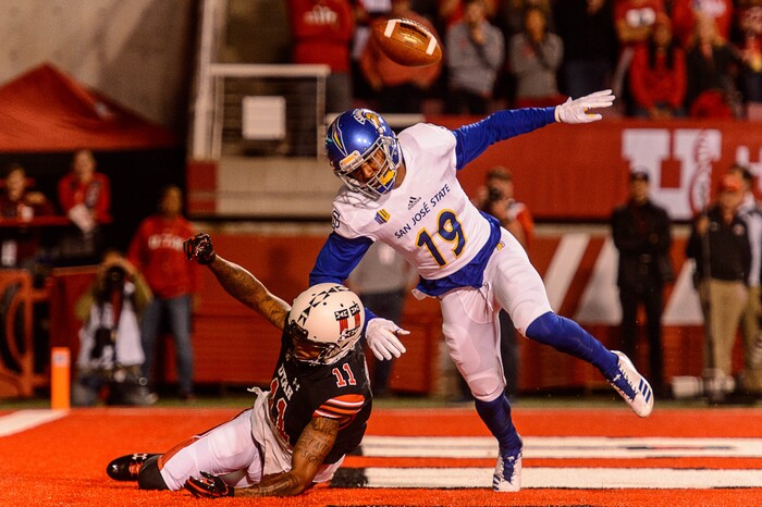 (Trent Nelson | The Salt Lake Tribune) San Jose State Spartans cornerback Dakari Monroe (19) knocks the ball away from Utah Utes wide receiver Raelon Singleton (11) as the Utah Utes host the San Jose State Spartans, NCAA football at Rice-Eccles Stadium in Salt Lake City, Saturday September 16, 2017.