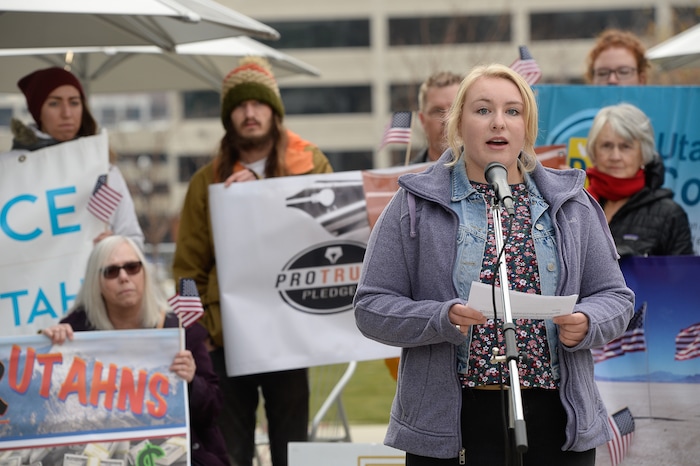 (Francisco Kjolseth  |  The Salt Lake Tribune)  Emily Jessop, a first-generation college student at SLCC, is facing a House tax plan that repeals the student loan interest deduction. A group of Utahns gathered to rally at the Wallace Bennett Federal Building in Salt Lake on Monday, Nov. 20, 2017, to tell personal stories of how they might be impacted by the tax reform plans currently on the table in Congress.
