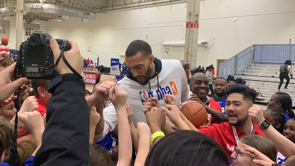 (Eric Walden  |  The Salt Lake Tribune) Utah Jazz center Rudy Gobert huddles up with school children participating in the All-Star Weekend Jr. NBA Day event at Navy Pier in Chicago on Friday, Feb. 14, 2020.