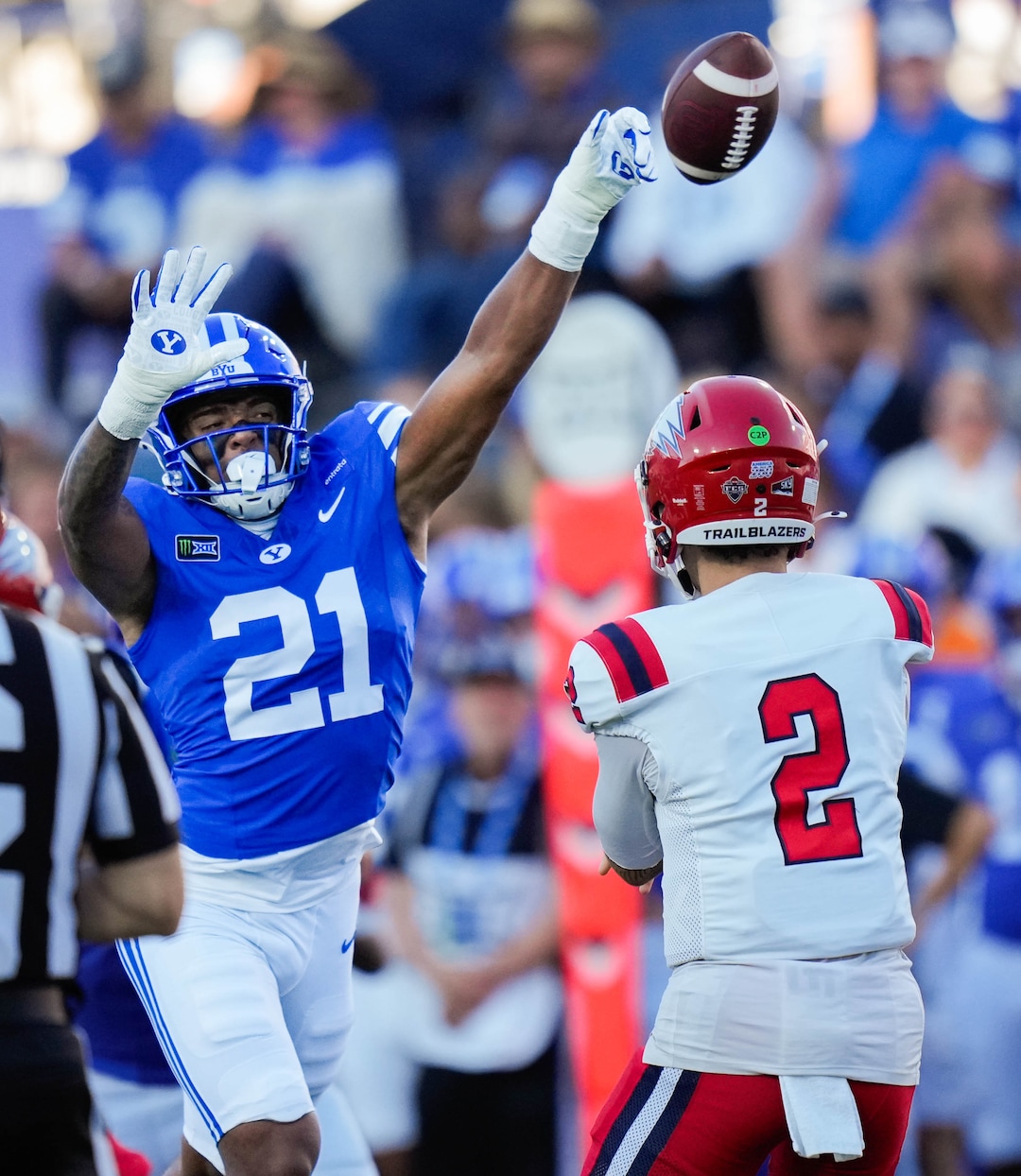 (Francisco Kjolseth | The Salt Lake Tribune) BYU Cougars linebacker Miles Hall (21) blocks a pass by Utah Tech Trailblazers quarterback CJ Tiller (2) during the first half of an NCAA college football game against Utah Tech, Saturday, Sept. 5, 2026, at LaVell Edwards Stadium in Provo.