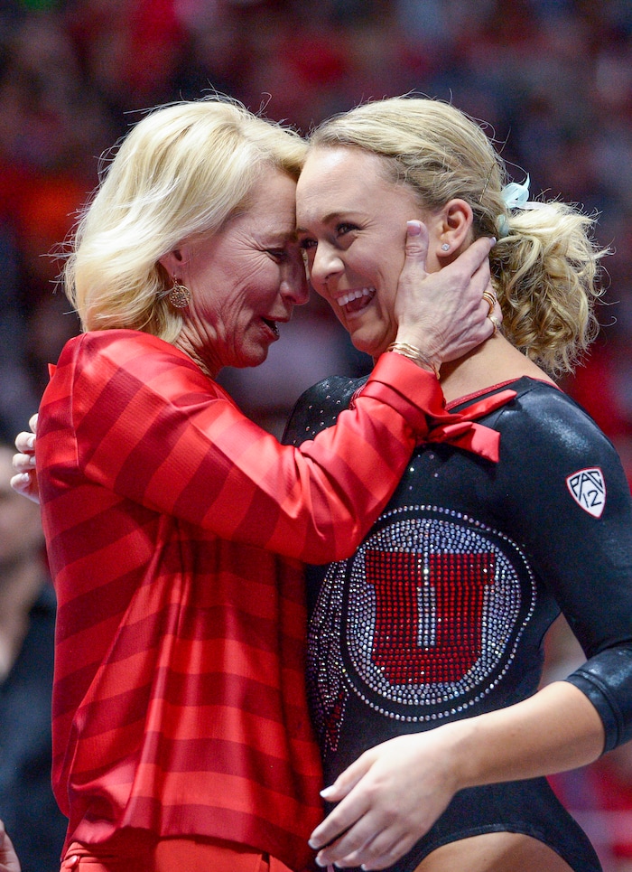 (Leah Hogsten  |  The Salt Lake Tribune) Head coach Megan Marsden congratulates outgoing senior Maddy Stover after her beam routine as the No. 4 Utah gymnasts host No. 20 Georgia in the final regular season meet at Jon M Huntsman Center in Salt Lake City Friday, March 16, 2018. 