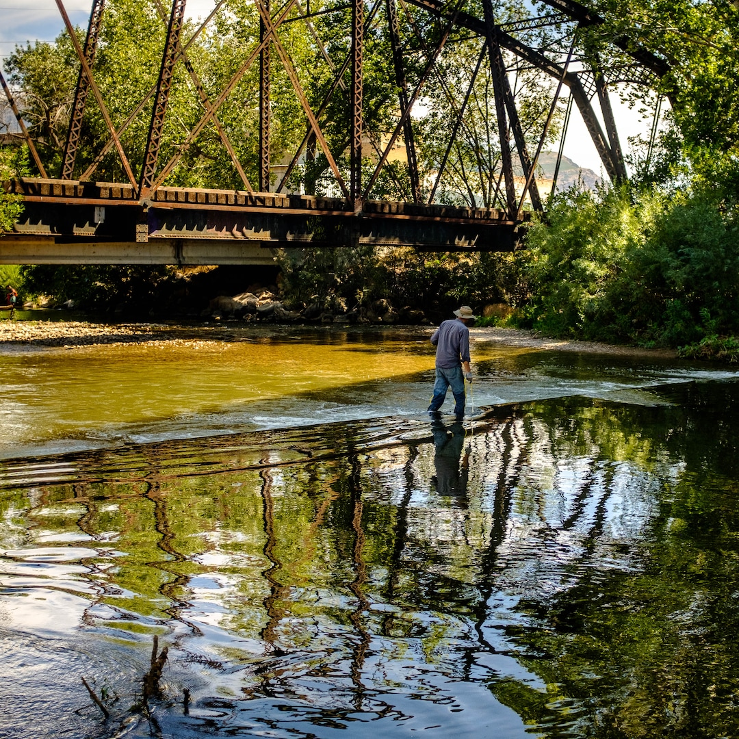 (Trent Nelson  |  The Salt Lake Tribune)  
A volunteer magnet fishing the Weber River on Saturday Aug. 31, 2019. Volunteers assisted the Utah Cold Case Coalition, hoping to find evidence in several cases.