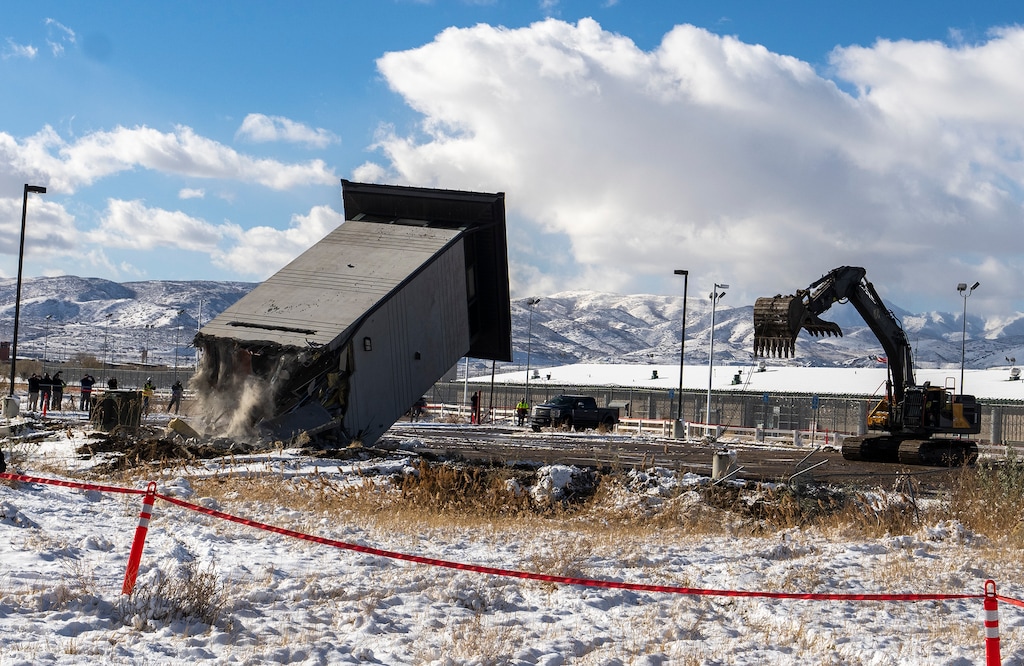 (Leah Hogsten | The Salt Lake Tribune) Demolition began on Tuesday at the former Utah State Prison in Draper with the toppling of a prison guard tower near the Timpanogos facility on Tuesday, Nov. 29, 2022. 