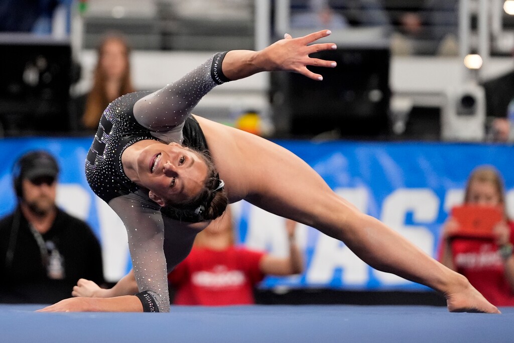 (Tony Gutierrez | AP) Utah's Grace McCallum competes in the floor exercise during the NCAA women's gymnastics championships in Fort Worth, Texas, Saturday, April 20, 2024.