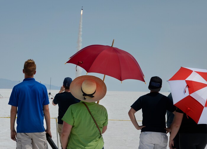 (Scott Sommerdorf   |  The Salt Lake Tribune)   Spectators watch rockets launch on the Bonneville Salt Flats during "HellFire" — the event sponsored by the Utah Rocket Association on Saturday, Aug. 5, 2017.