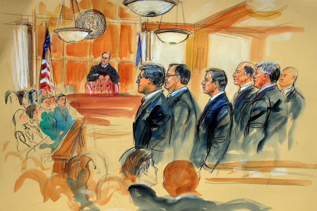 This courtroom sketch depicts Paul Manafort, fourth from right, standing with his lawyers in front of U.S. district Judge T.S. Ellis III, center rear, and the selected jury, seated left, during the jury selection of his trial at the Alexandria Federal Courthouse in Alexandria, Va., Tuesday, July 31, 2018. A jury set to decide the fate of President Donald Trump's former campaign chairman Manafort was selected Tuesday, and opening statements in his tax evasion and bank fraud trial were expected in the afternoon. (Dana Verkouteren via AP)