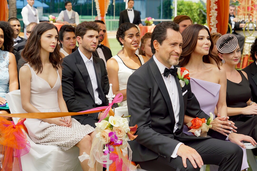 This image provided by ABC shows Denyse Tontz, left, Bryan Craig, second from left, Demian Bichir, front, and Roselyn Sanchez in a scene from the network's series "Grand Hotel." Eva Longoria executive produces this drama set at the last family-owned hotel in Miami Beach. (Eric McCandless/ABC via AP)
