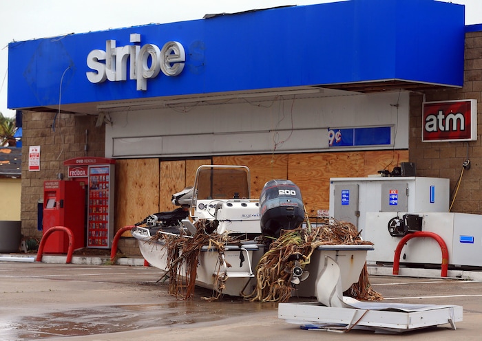 (Gabe Hernandez | Corpus Christi Caller-Times via AP) A boat is located on land after Hurricane Harvey landed in the Coast Bend area on Saturday, Aug. 26, 2017, in Port Aransas, Texas. The National Hurricane Center has downgraded Harvey from a Category 1 hurricane to a tropical storm. Harvey came ashore Friday along the Texas Gulf Coast as a Category 4 storm with 130 mph winds, the most powerful hurricane to hit the U.S. in more than a decade.