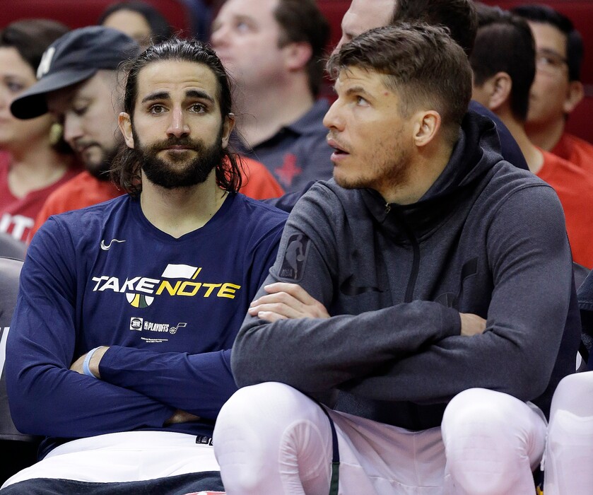 Utah Jazz guard Ricky Rubio, left, and guard Kyle Korver sit on the bench late in the second half of Game 1 of an NBA basketball first-round playoff series against the Houston Rockets, Sunday, April 14, 2019, in Houston. Houston won the game 122-90. (AP Photo/Eric Christian Smith)